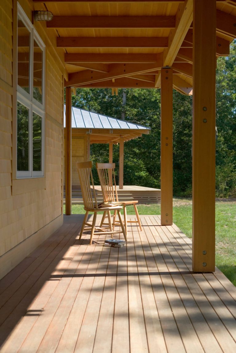 Inspiration for a country porch remodel in Boston with a roof extension by Moskow Linn Architects | Outdoor Photos | Porch | Landscaping | Landscape Design | Outdoor Living Space | Porch Design Ideas | Outdoor Living Space Ideas | Backyard Design