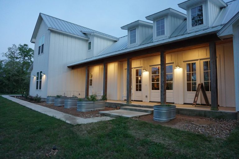 Inspiration for a country porch remodel in Houston with a roof extension by Maegan & Jared Whitaker | Outdoor Photos | Porch | Landscaping | Landscape Design | Outdoor Living Space | Porch Design Ideas | Outdoor Living Space Ideas | Backyard Design