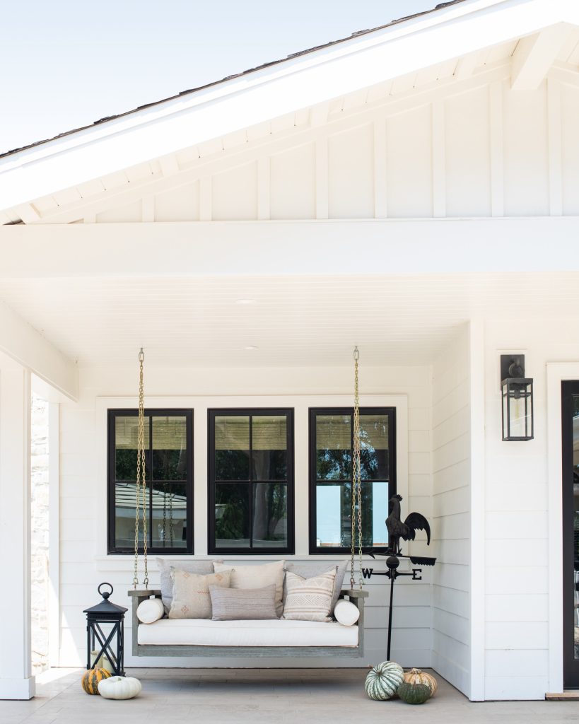 Inspiration for a country porch remodel in Los Angeles with a roof extension by Norman Design Group, Inc. | Outdoor Photos | Porch | Landscaping | Landscape Design | Outdoor Living Space | Porch Design Ideas | Outdoor Living Space Ideas | Backyard Design