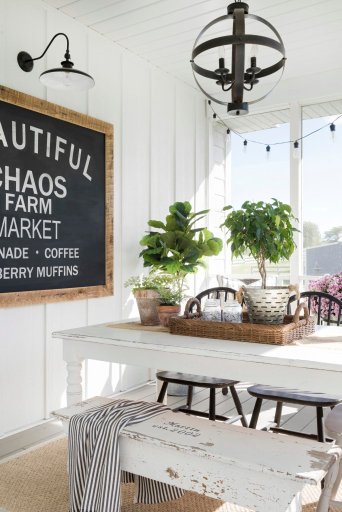 Inspiration for a country screened-in back porch remodel in Minneapolis by Beautiful Chaos Interior Design & Styling | Outdoor Photos | Porch | Landscaping | Landscape Design | Outdoor Living Space | Porch Design Ideas | Outdoor Living Space Ideas | Backyard Design