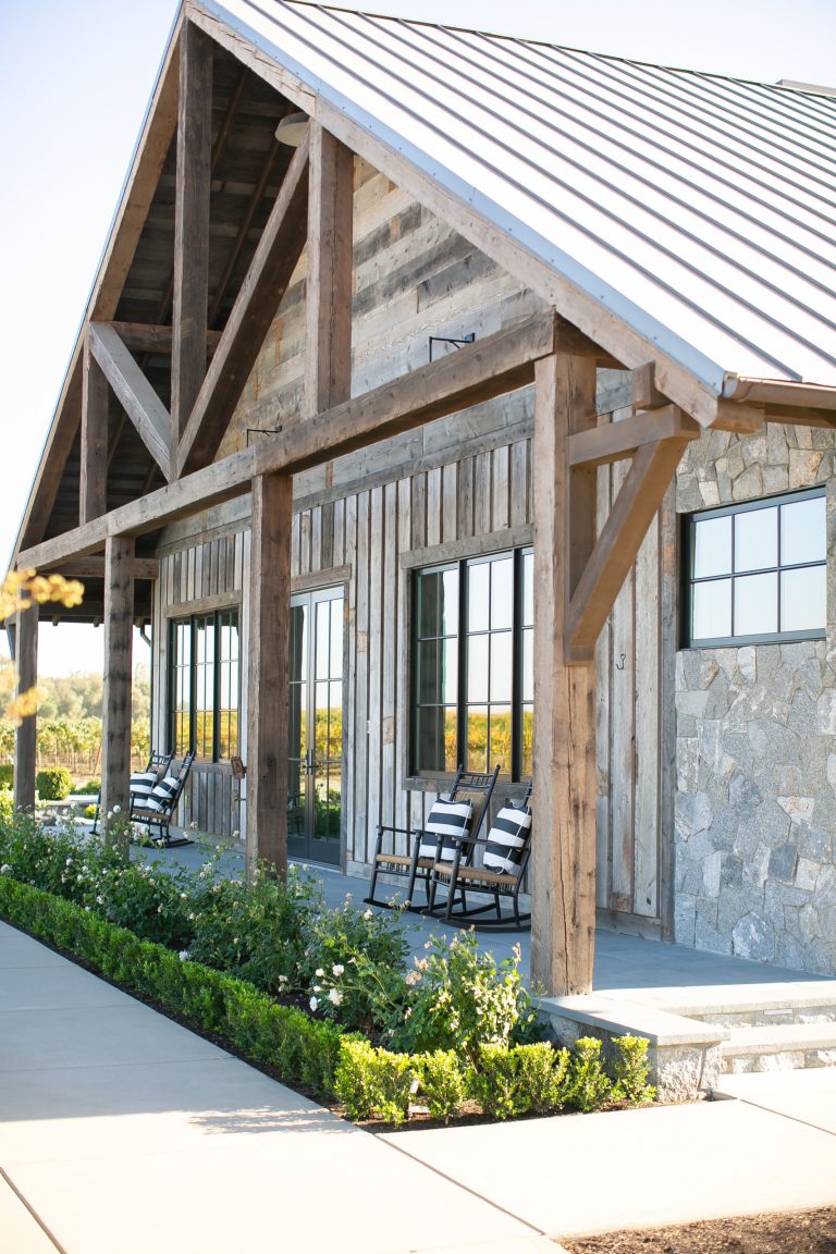 Inspiration for a farmhouse porch remodel in Orange County with a roof extension by Jodi Fleming Design | Outdoor Photos | Porch | Landscaping | Landscape Design | Outdoor Living Space | Porch Design Ideas | Outdoor Living Space Ideas | Backyard Design