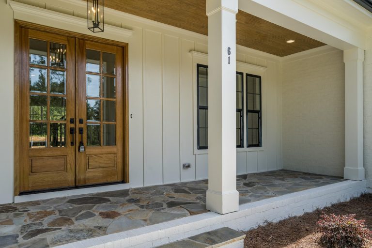 Inspiration for a farmhouse porch remodel in Raleigh by Poythress Construction Company Inc. | Outdoor Photos | Porch | Landscaping | Landscape Design | Outdoor Living Space | Porch Design Ideas | Outdoor Living Space Ideas | Backyard Design
