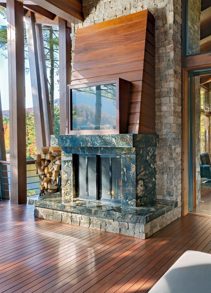 Inspiration for a huge contemporary side porch remodel in Other with a fire pit, decking and a roof extension by Mountain Marble & Granite, Inc | Outdoor Photos | Porch | Landscaping | Landscape Design | Outdoor Living Space | Porch Design Ideas | Outdoor Living Space Ideas | Backyard Design