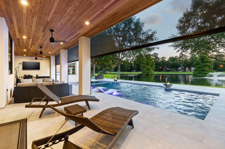 Inspiration for a huge modern backyard tile patio kitchen remodel in Houston