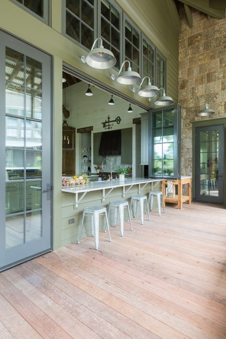 Inspiration for a huge rustic patio kitchen remodel in Other with a roof extension