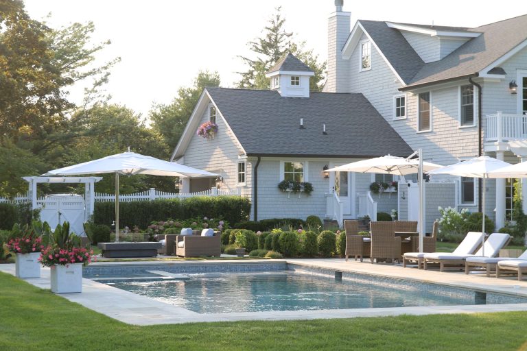 Inspiration for a huge timeless backyard stone and rectangular lap hot tub remodel in New York