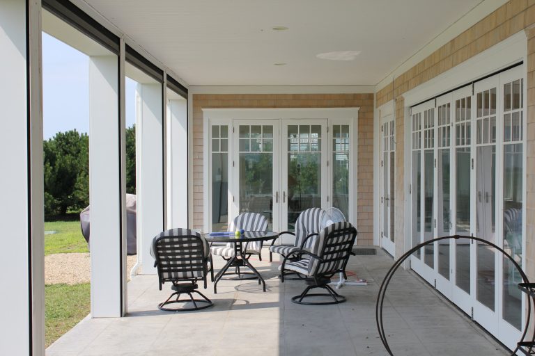 Inspiration for a huge timeless concrete screened-in side porch remodel in DC Metro with a roof extension by Princeton Design Build | Outdoor Photos | Porch | Landscaping | Landscape Design | Outdoor Living Space | Porch Design Ideas | Outdoor Living Space Ideas | Backyard Design