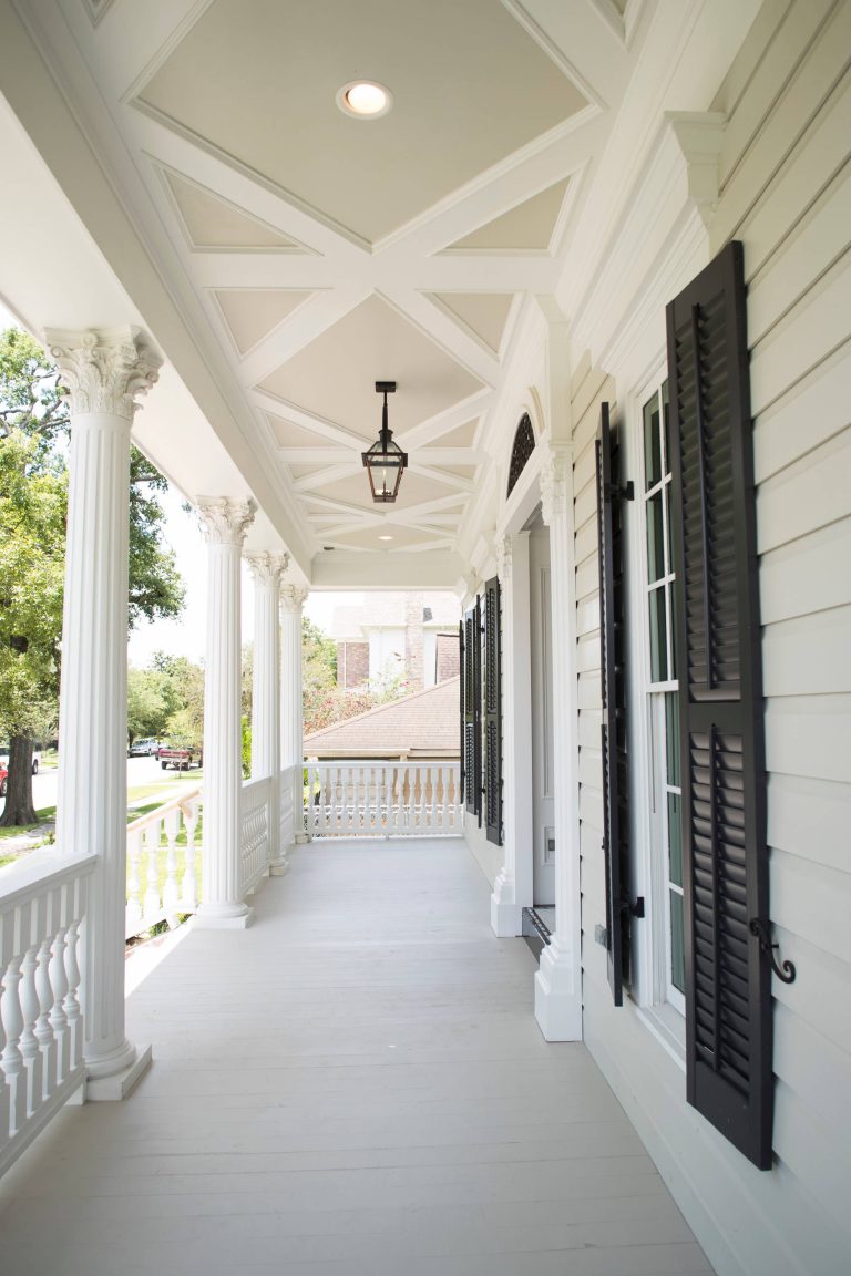 Inspiration for a huge timeless mixed material railing front porch remodel in Houston with a roof extension by Aspire Fine Homes | Outdoor Photos | Porch | Landscaping | Landscape Design | Outdoor Living Space | Porch Design Ideas | Outdoor Living Space Ideas | Backyard Design