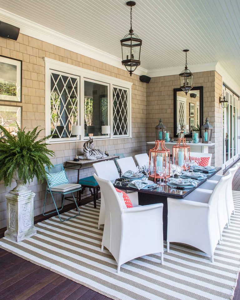 Inspiration for a large coastal backyard deck remodel in New York with a roof extension