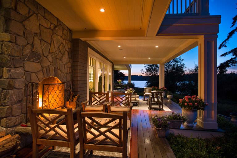 Inspiration for a large coastal backyard outdoor kitchen deck remodel in Seattle with a roof extension