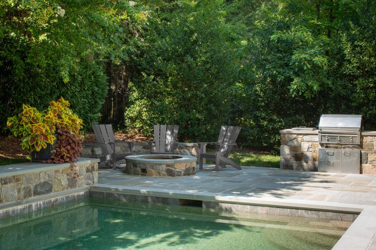 Inspiration for a large coastal backyard stone and rectangular natural pool fountain remodel in Baltimore