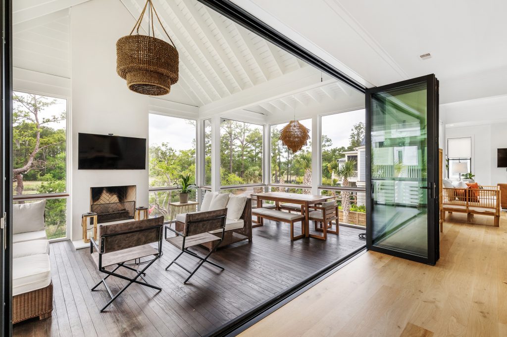 Inspiration for a large coastal screened-in and metal railing back porch remodel in Charleston by Coleman Builders, LLC | Outdoor Photos | Porch | Landscaping | Landscape Design | Outdoor Living Space | Porch Design Ideas | Outdoor Living Space Ideas | Backyard Design