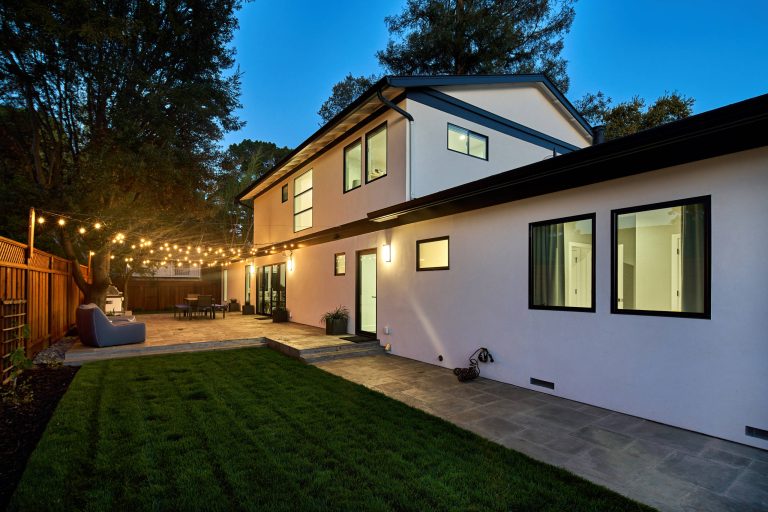 Inspiration for a large contemporary backyard concrete paver patio kitchen remodel in San Francisco with no cover