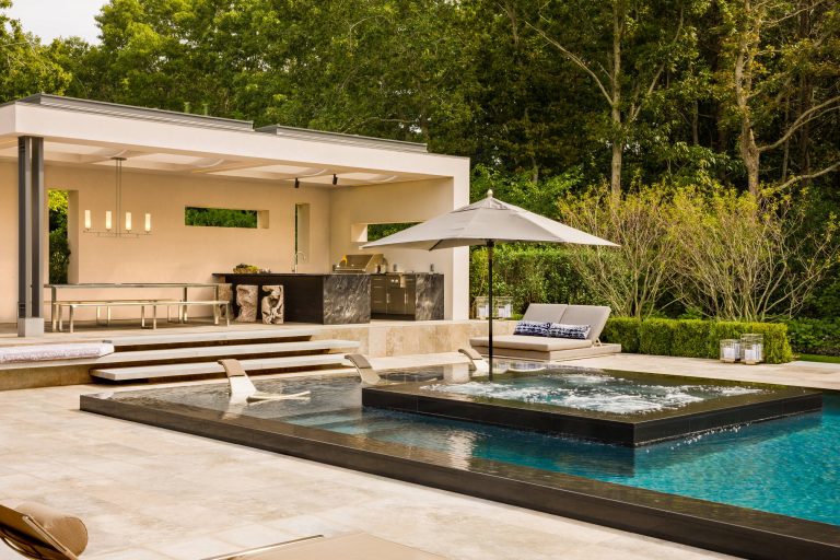 Inspiration for a large contemporary backyard rectangular pool remodel in New York