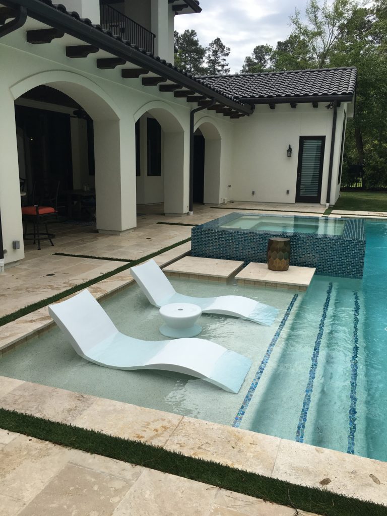 Inspiration for a large contemporary backyard tile and rectangular lap hot tub remodel in Houston