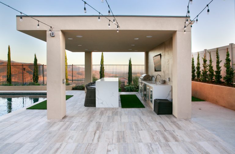 Inspiration for a large contemporary backyard tile patio kitchen remodel in San Diego with a gazebo