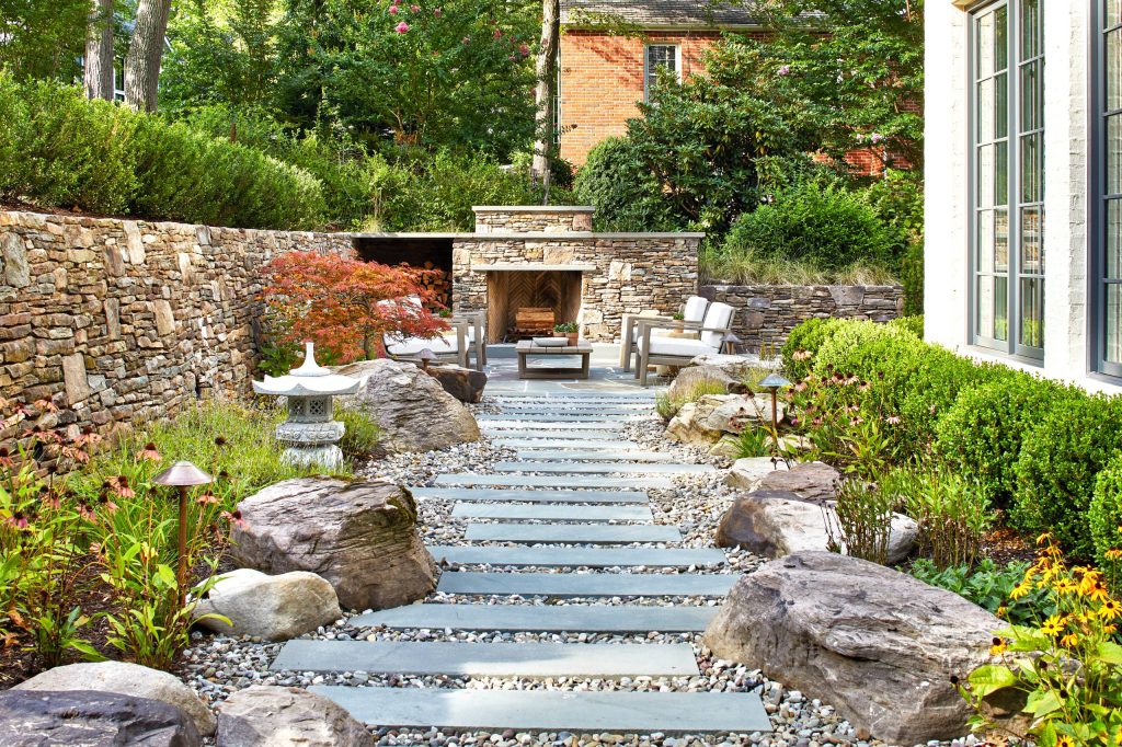Inspiration for a large contemporary full sun backyard stone walkway in DC Metro for summer.