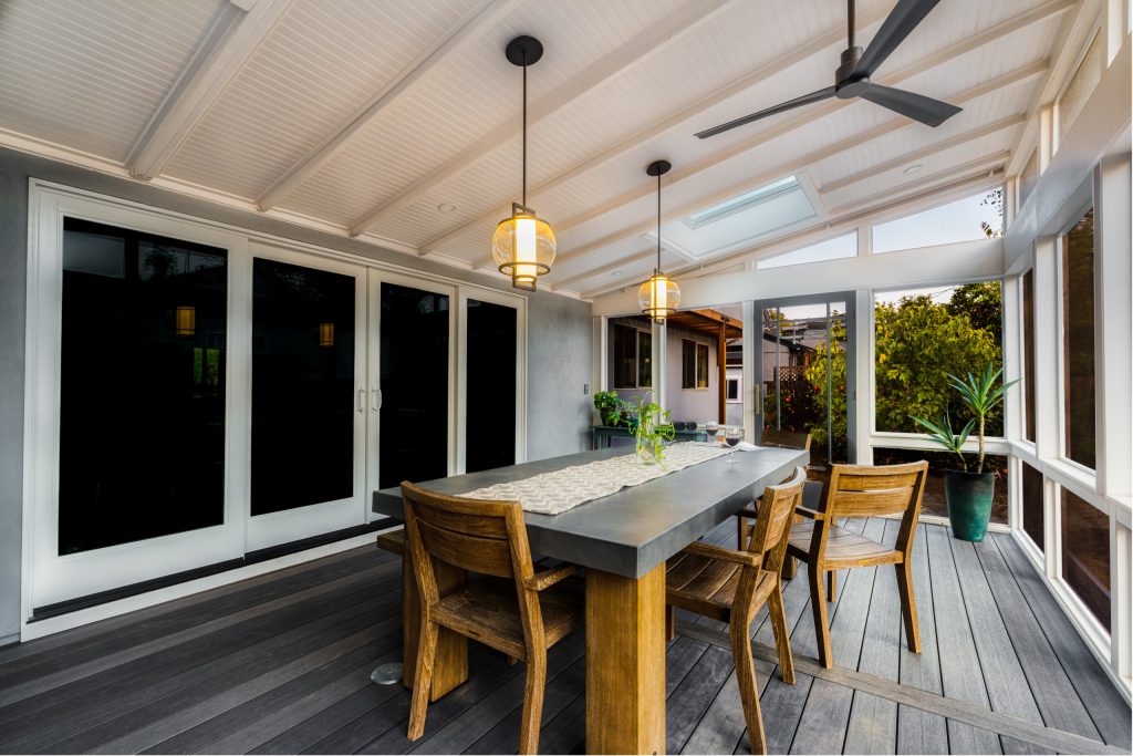 Inspiration for a large contemporary screened-in back porch remodel in Sacramento with decking and a roof extension by MAK Design + Build Inc. | Outdoor Photos | Porch | Landscaping | Landscape Design | Outdoor Living Space | Porch Design Ideas | Outdoor Living Space Ideas | Backyard Design