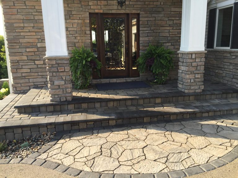 Inspiration for a large cottage concrete paver front porch remodel in Minneapolis with a roof extension by Hartman Companies, Inc. | Outdoor Photos | Porch | Landscaping | Landscape Design | Outdoor Living Space | Porch Design Ideas | Outdoor Living Space Ideas | Backyard Design