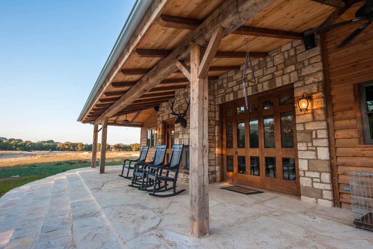 Inspiration for a large cottage stone porch remodel in Bridgeport with a roof extension by Heritage Restorations CT | Outdoor Photos | Porch | Landscaping | Landscape Design | Outdoor Living Space | Porch Design Ideas | Outdoor Living Space Ideas | Backyard Design