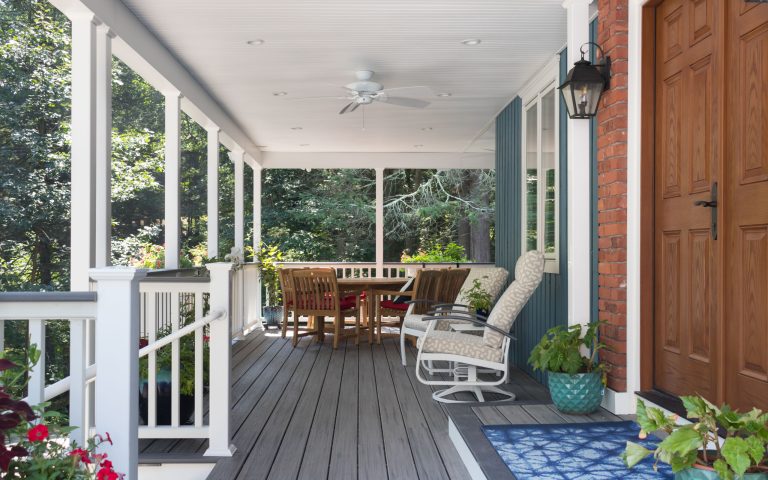 Inspiration for a large country front porch remodel in Other with decking and a roof extension by Taylor Bryan Company | Outdoor Photos | Porch | Landscaping | Landscape Design | Outdoor Living Space | Porch Design Ideas | Outdoor Living Space Ideas | Backyard Design