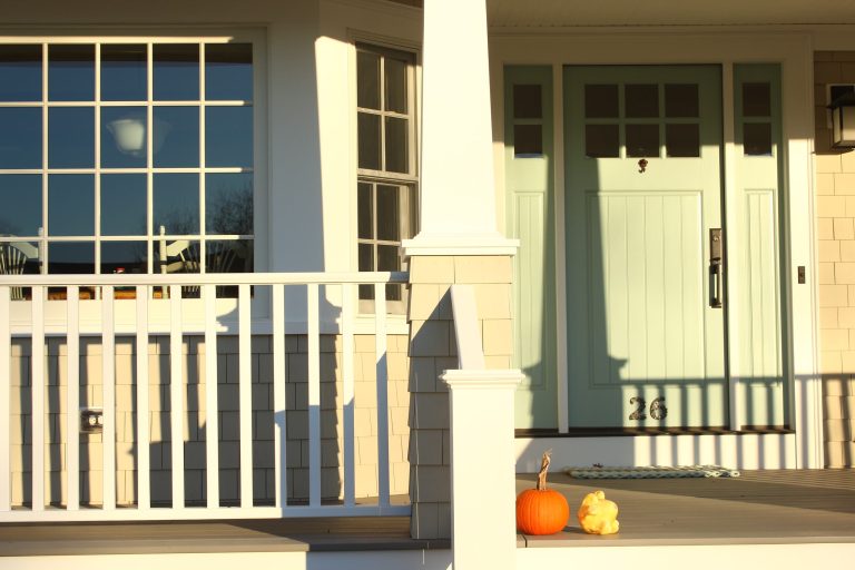 Inspiration for a large country front porch remodel in Providence with decking and a roof extension by Oden Home | Outdoor Photos | Porch | Landscaping | Landscape Design | Outdoor Living Space | Porch Design Ideas | Outdoor Living Space Ideas | Backyard Design