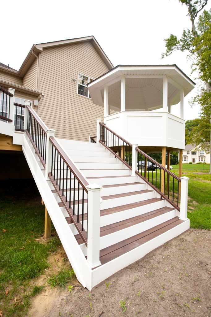 Inspiration for a large craftsman back porch remodel in Philadelphia with decking and a roof extension by Darlington Designs | Outdoor Photos | Porch | Landscaping | Landscape Design | Outdoor Living Space | Porch Design Ideas | Outdoor Living Space Ideas | Backyard Design