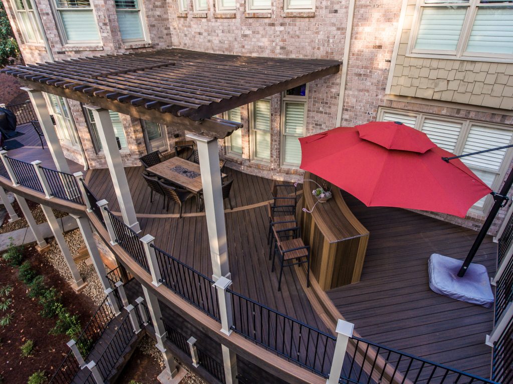 Inspiration for a large craftsman backyard outdoor kitchen deck remodel in Atlanta with a pergola