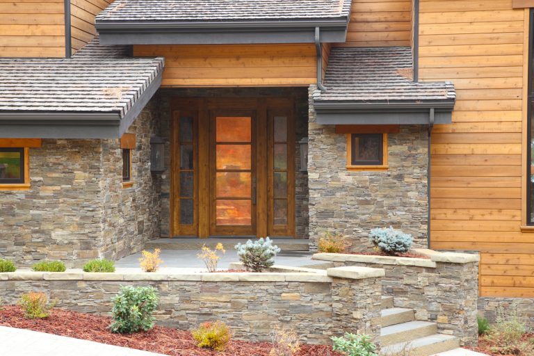 Inspiration for a large craftsman front porch remodel in Seattle with a roof extension by Dana Construction Company LLC | Outdoor Photos | Porch | Landscaping | Landscape Design | Outdoor Living Space | Porch Design Ideas | Outdoor Living Space Ideas | Backyard Design