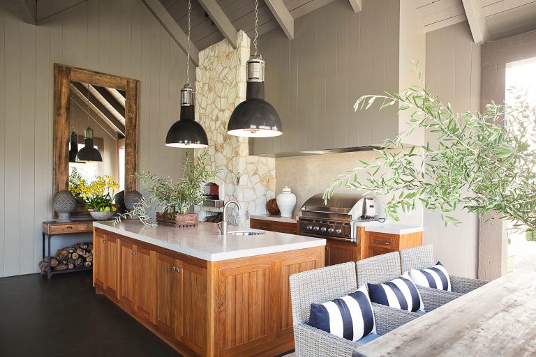 Inspiration for a large farmhouse backyard concrete patio kitchen remodel in San Francisco with a roof extension