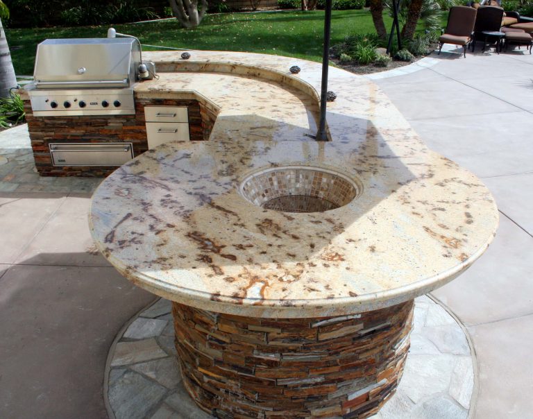 Inspiration for a large mediterranean backyard concrete patio kitchen remodel in San Diego with no cover