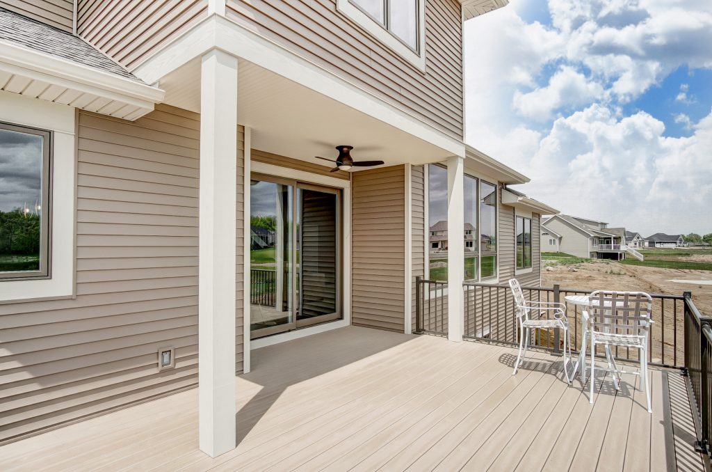 Inspiration for a large modern back porch remodel in Other with decking and a roof extension by Bob Buescher Homes | Outdoor Photos | Porch | Landscaping | Landscape Design | Outdoor Living Space | Porch Design Ideas | Outdoor Living Space Ideas | Backyard Design