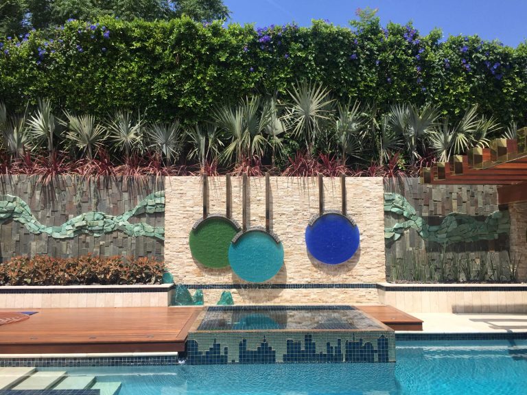 Inspiration for a large modern backyard tile and rectangular lap hot tub remodel in Los Angeles