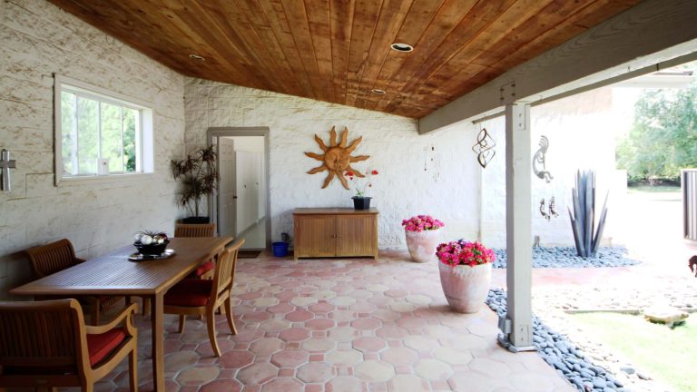 Inspiration for a large modern tile back porch remodel in Dallas with a roof extension by Cantoni Dallas | Outdoor Photos | Porch | Landscaping | Landscape Design | Outdoor Living Space | Porch Design Ideas | Outdoor Living Space Ideas | Backyard Design