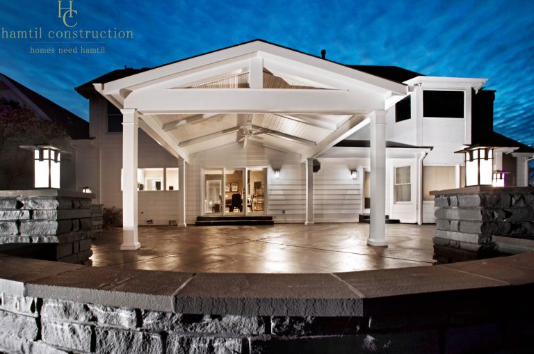 Inspiration for a large scandinavian backyard concrete patio kitchen remodel in St Louis with a roof extension
