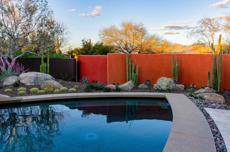 Inspiration for a large southwestern drought-tolerant backyard gravel landscaping in Phoenix.