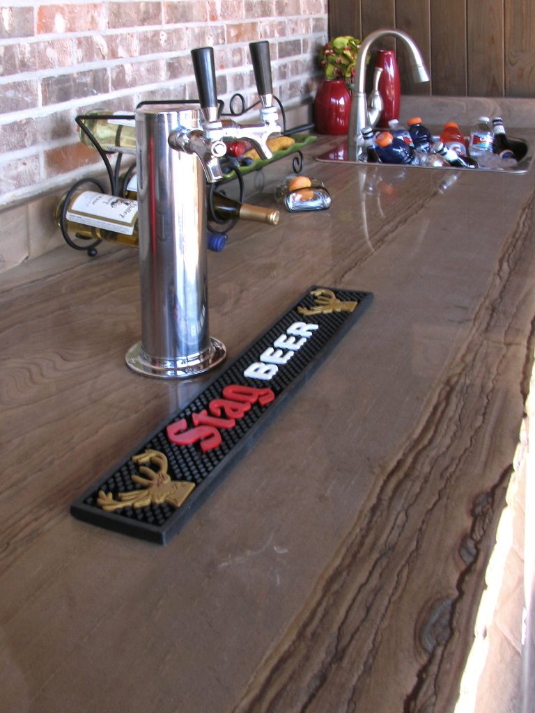 Inspiration for a large timeless concrete paver porch remodel in St Louis with a roof extension