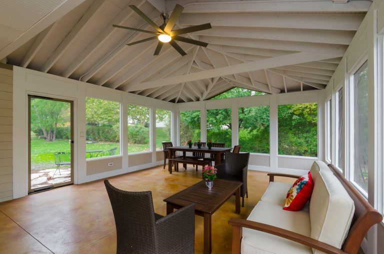 Inspiration for a large timeless concrete screened-in back porch remodel in Chicago with a roof extension by Synergy Builders Inc. | Outdoor Photos | Porch | Landscaping | Landscape Design | Outdoor Living Space | Porch Design Ideas | Outdoor Living Space Ideas | Backyard Design