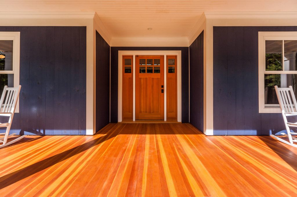 Inspiration for a large timeless front porch remodel in Boston with decking and a roof extension by Pete Conrad Construction | Outdoor Photos | Porch | Landscaping | Landscape Design | Outdoor Living Space | Porch Design Ideas | Outdoor Living Space Ideas | Backyard Design