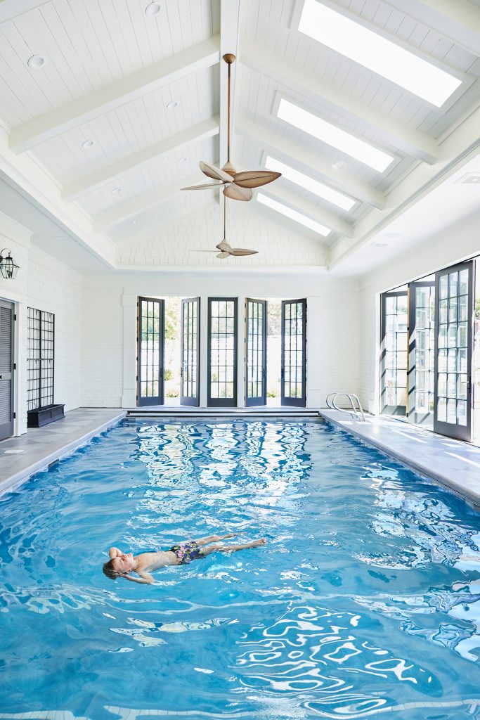 Inspiration for a large timeless indoor concrete and rectangular pool remodel in Salt Lake City