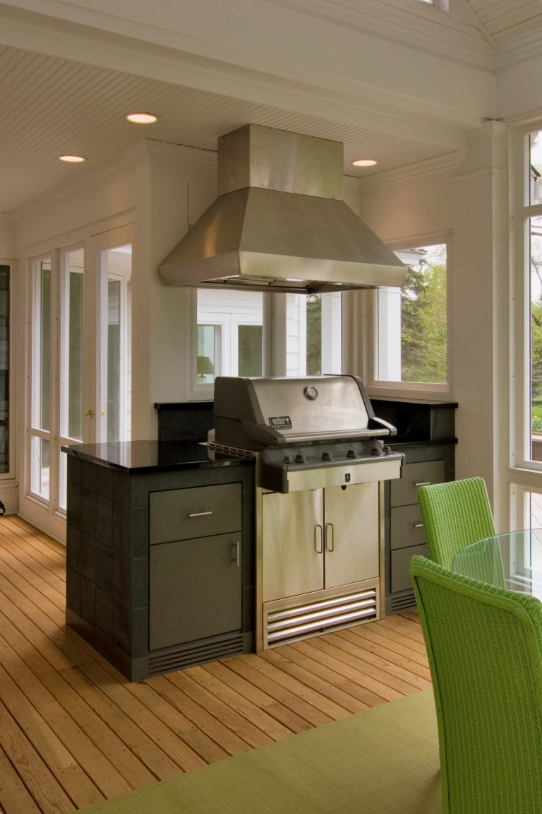 Inspiration for a large timeless screened-in back porch remodel in Minneapolis with decking and a roof extension by Quigley Architects | Outdoor Photos | Porch | Landscaping | Landscape Design | Outdoor Living Space | Porch Design Ideas | Outdoor Living Space Ideas | Backyard Design