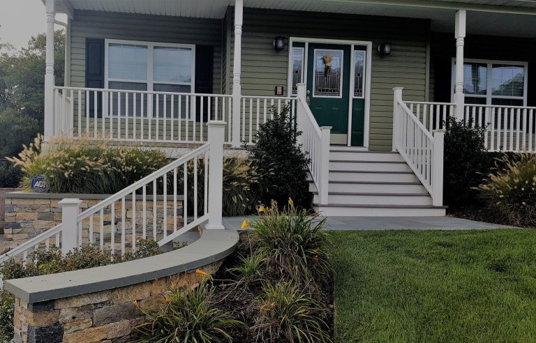 Inspiration for a large timeless stone front porch remodel in New York with a roof extension by Castro StoneWorks NY - Masonry Contractors | Outdoor Photos | Porch | Landscaping | Landscape Design | Outdoor Living Space | Porch Design Ideas | Outdoor Living Space Ideas | Backyard Design