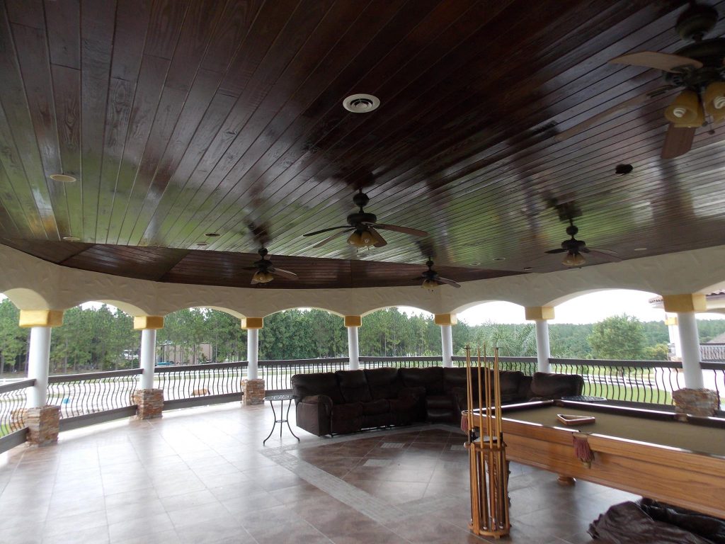 Inspiration for a large timeless tile back porch remodel in Orlando with a roof extension by Masters Touch Painting and Remodeling | Outdoor Photos | Porch | Landscaping | Landscape Design | Outdoor Living Space | Porch Design Ideas | Outdoor Living Space Ideas | Backyard Design