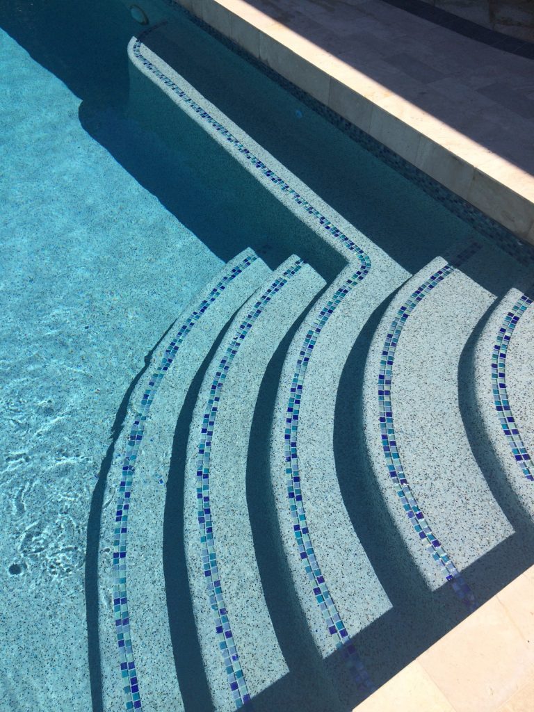 Inspiration for a large transitional backyard rectangular and tile lap pool remodel in Miami