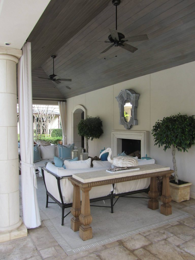 Inspiration for a large transitional backyard tile patio kitchen remodel in Houston with a roof extension