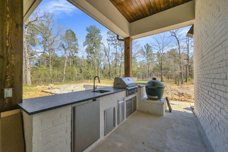 Inspiration for a large transitional concrete back porch remodel in Houston with a fireplace and a roof extension by Wyrick Residential Design | Outdoor Photos | Porch | Landscaping | Landscape Design | Outdoor Living Space | Porch Design Ideas | Outdoor Living Space Ideas | Backyard Design