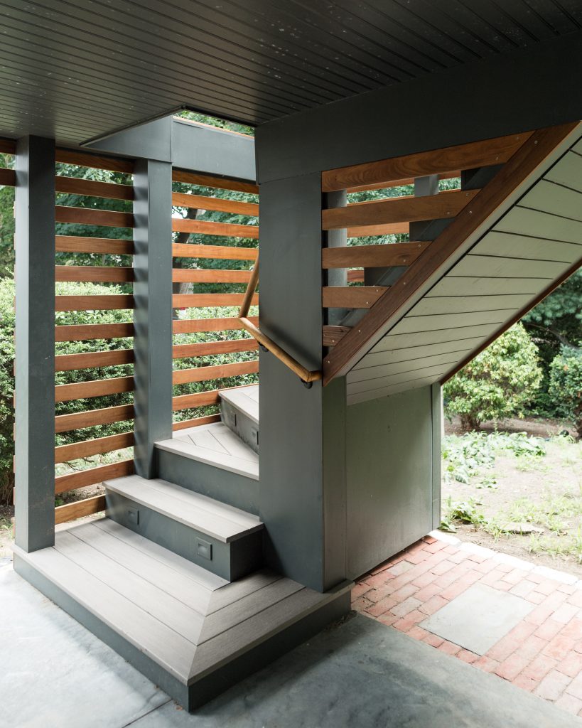 Inspiration for a large transitional concrete screened-in and wood railing back porch remodel in Boston with a roof extension by Rebel Builders | Outdoor Photos | Porch | Landscaping | Landscape Design | Outdoor Living Space | Porch Design Ideas | Outdoor Living Space Ideas | Backyard Design