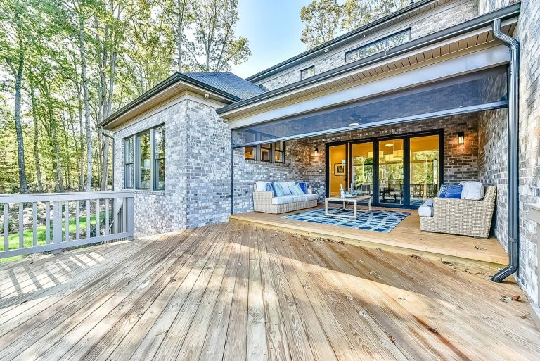 Inspiration for a large transitional screened-in back porch remodel in Charlotte with decking and a roof extension by Shea Homes Charlotte | Outdoor Photos | Porch | Landscaping | Landscape Design | Outdoor Living Space | Porch Design Ideas | Outdoor Living Space Ideas | Backyard Design