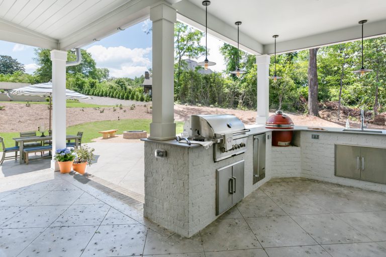 Inspiration for a large transitional stamped concrete porch remodel in Birmingham with a roof extension by J. Wright Building Company | Outdoor Photos | Porch | Landscaping | Landscape Design | Outdoor Living Space | Porch Design Ideas | Outdoor Living Space Ideas | Backyard Design