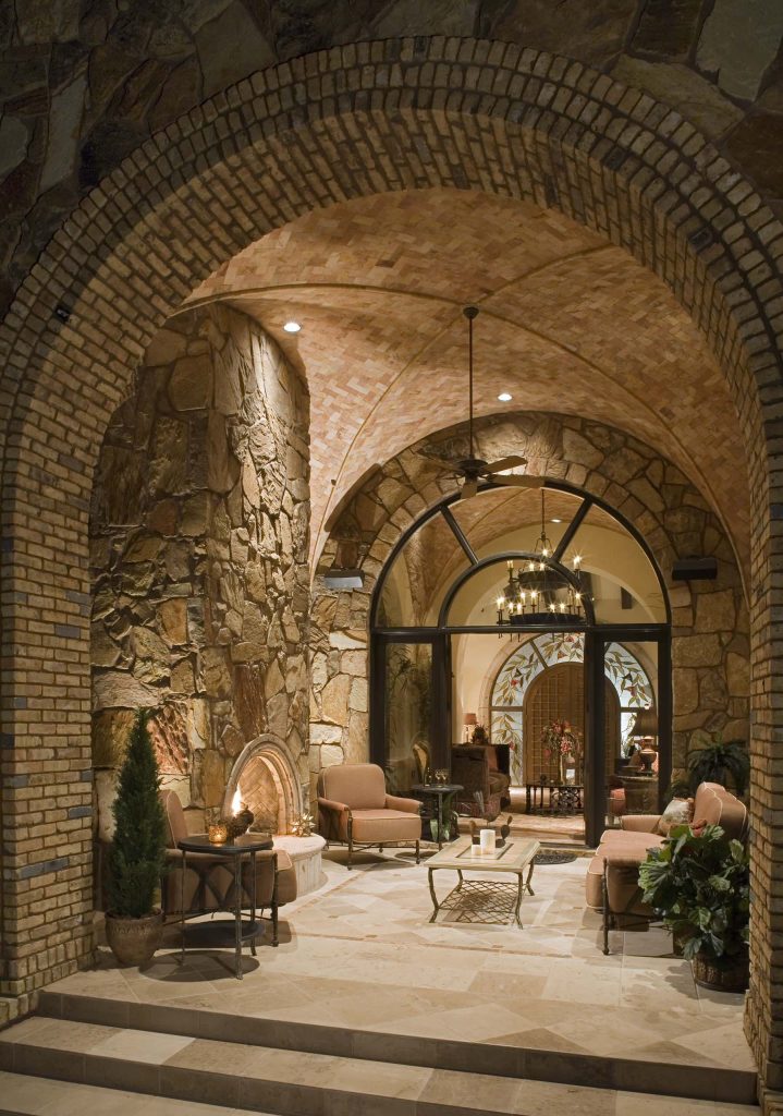 Inspiration for a mediterranean porch remodel in Austin with a fire pit by JAUREGUI Architecture Interiors Construction | Outdoor Photos | Porch | Landscaping | Landscape Design | Outdoor Living Space | Porch Design Ideas | Outdoor Living Space Ideas | Backyard Design